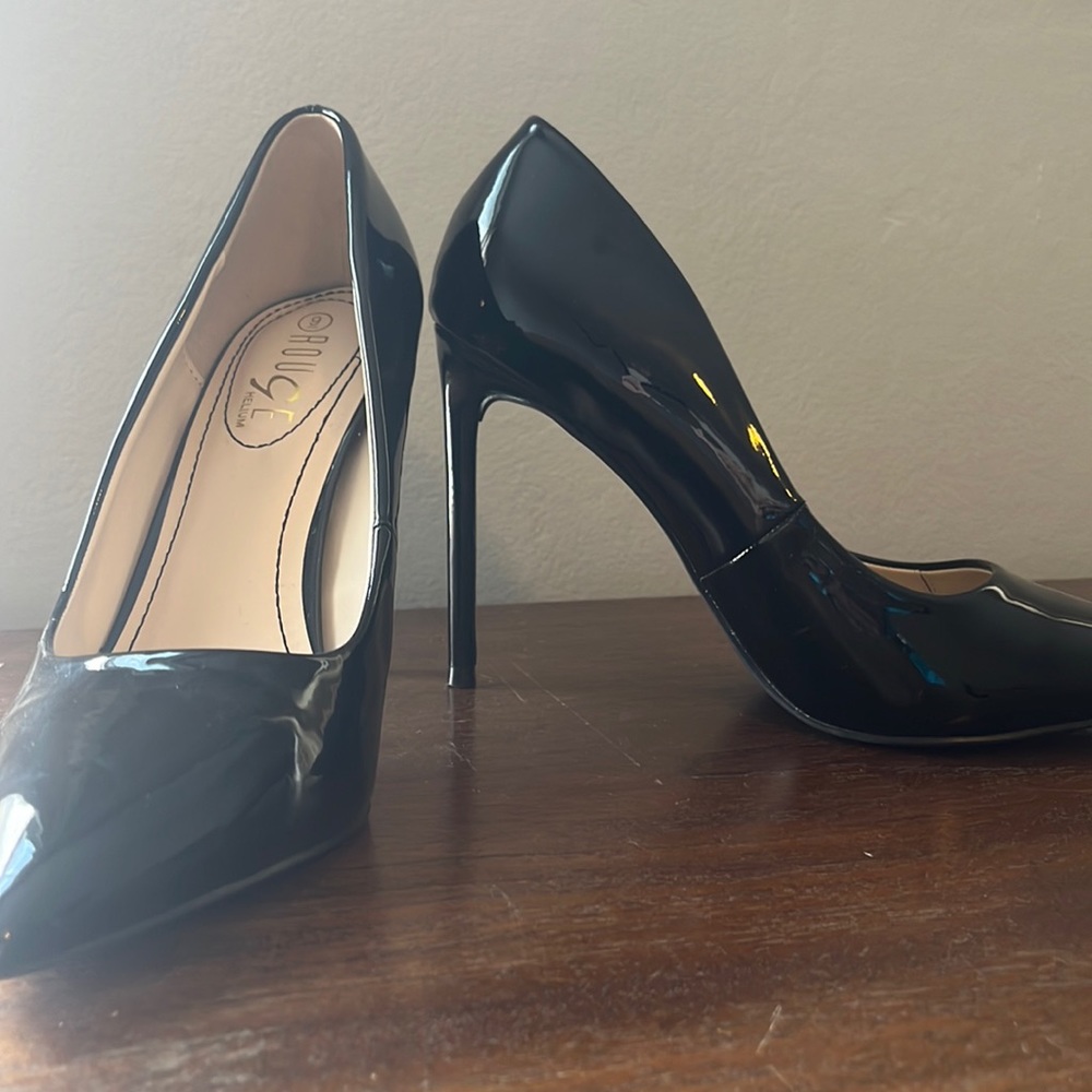 Size 9, black patent leather pumps never worn